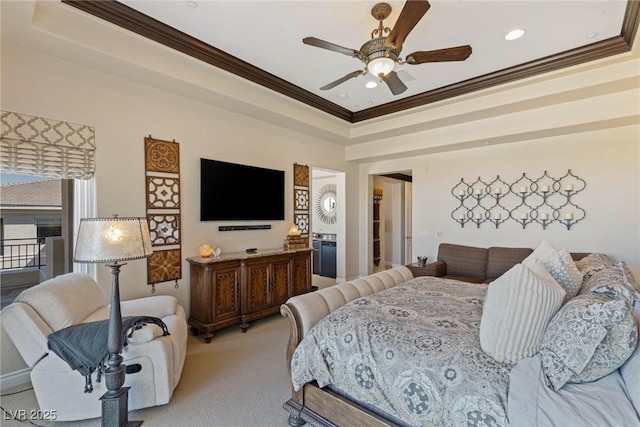 bedroom featuring ornamental molding, light colored carpet, and ceiling fan