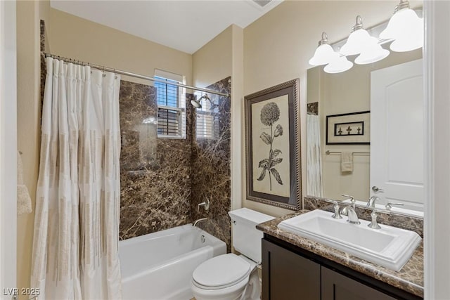 full bathroom with vanity, shower / bath combination with curtain, and toilet