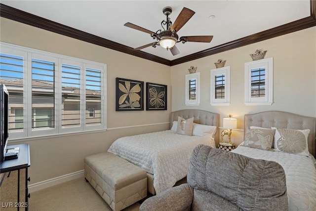 carpeted bedroom with crown molding and ceiling fan