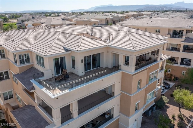 drone / aerial view featuring a mountain view