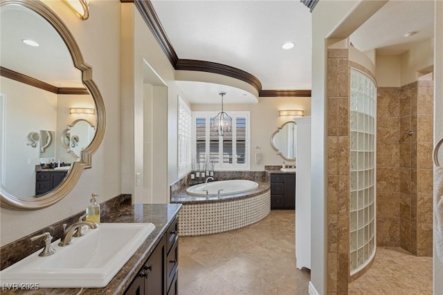 bathroom with crown molding, a wealth of natural light, vanity, and plus walk in shower