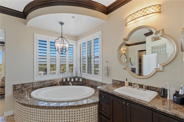 bathroom featuring a notable chandelier, crown molding, tiled bath, and vanity