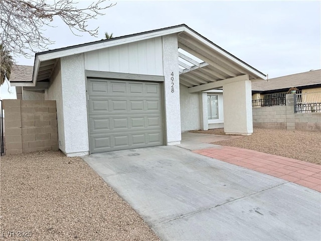 single story home with a garage