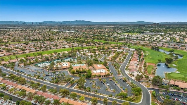 aerial view featuring a water and mountain view