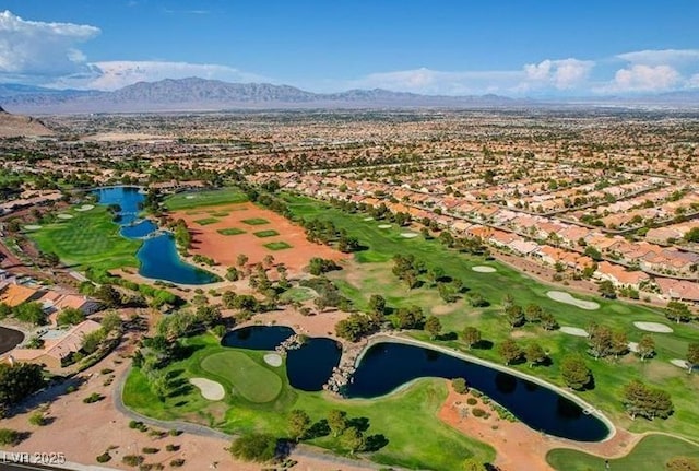 bird's eye view featuring a water and mountain view