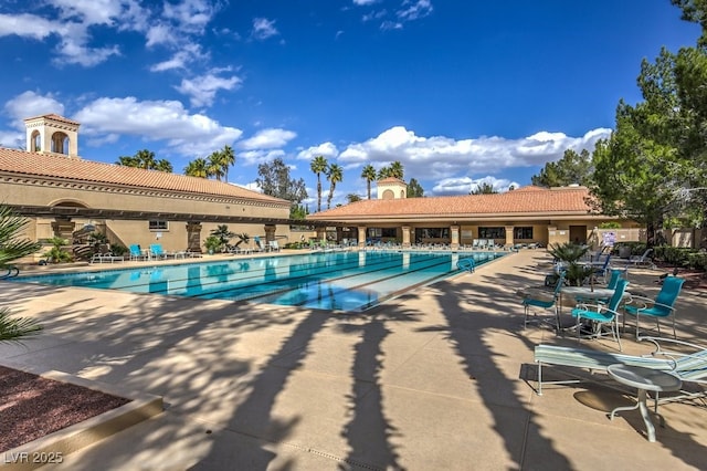 view of pool featuring a patio