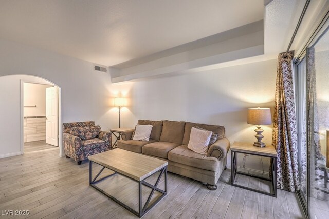 living room with light hardwood / wood-style floors