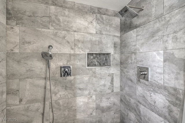 details featuring tiled shower