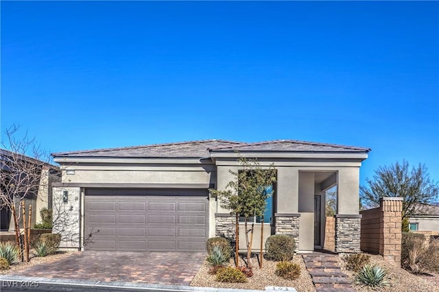 view of front of home with a garage