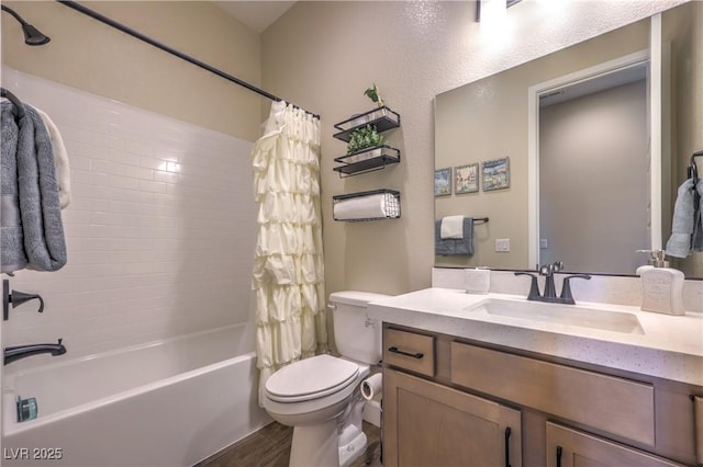 full bathroom with toilet, vanity, shower / bathtub combination with curtain, and hardwood / wood-style floors