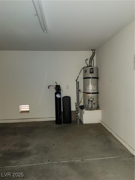 garage with strapped water heater