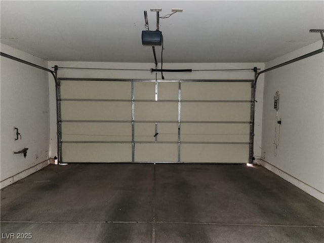 garage featuring a garage door opener