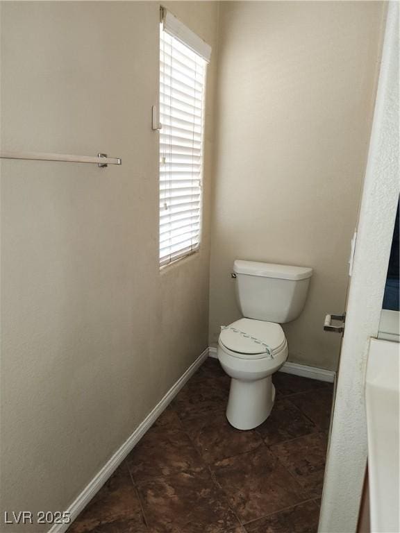 bathroom featuring toilet