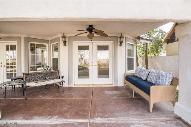 view of patio / terrace with an outdoor living space, french doors, and ceiling fan