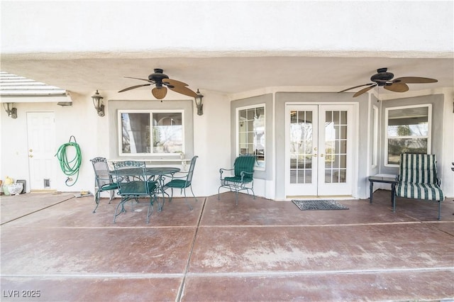 view of patio / terrace featuring french doors and ceiling fan