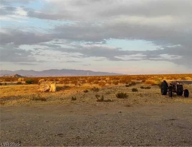 exterior space with a mountain view and a rural view