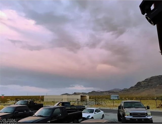 parking at dusk with a mountain view