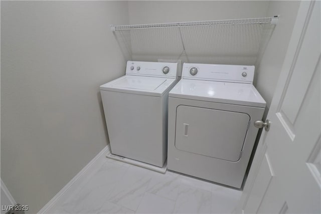 washroom with separate washer and dryer