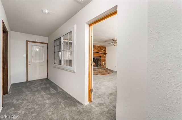 hallway with dark carpet