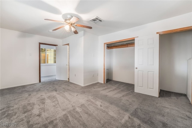 unfurnished bedroom featuring carpet flooring, ceiling fan, and a closet