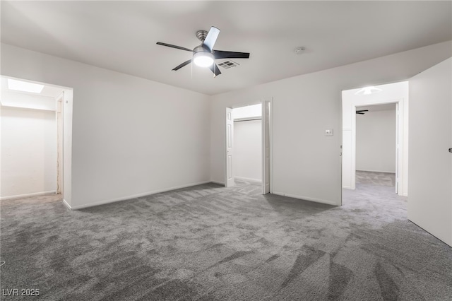 unfurnished bedroom featuring ceiling fan and carpet flooring