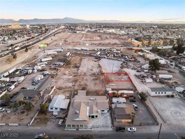 drone / aerial view featuring a mountain view