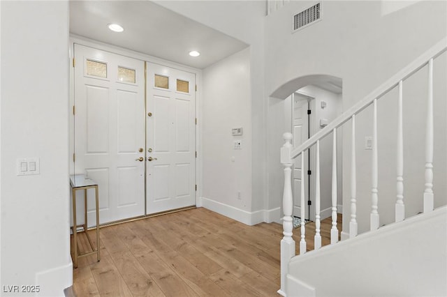 foyer with light wood-type flooring