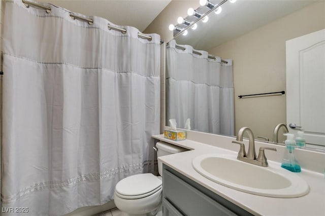 bathroom featuring vanity, curtained shower, and toilet