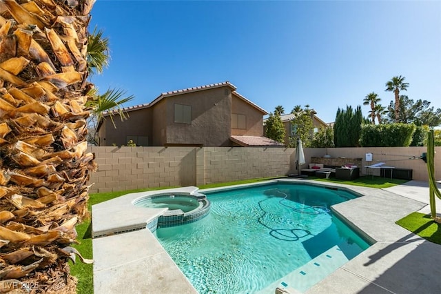 view of pool featuring central AC unit and an in ground hot tub