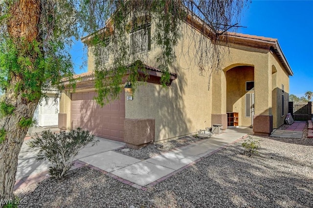 exterior space with a garage