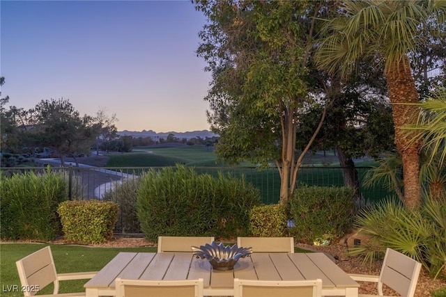 view of patio terrace at dusk