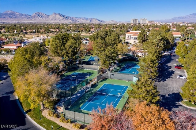 birds eye view of property with a mountain view