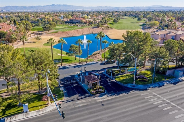 bird's eye view with a water and mountain view