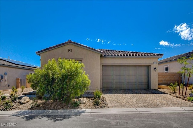 view of front of home featuring a garage