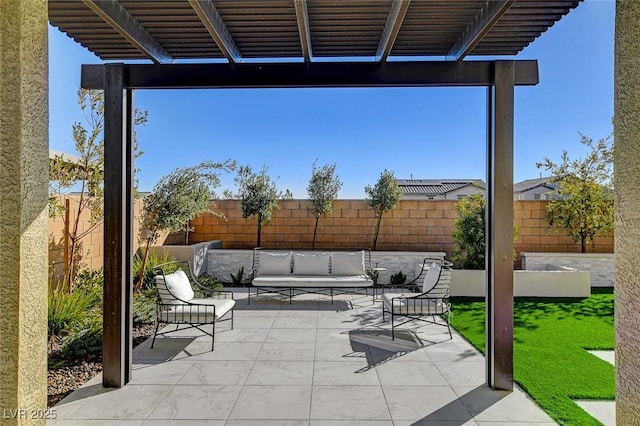 view of patio / terrace featuring an outdoor living space and a pergola