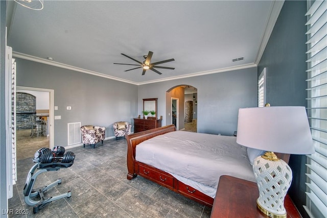 bedroom featuring ornamental molding and ceiling fan