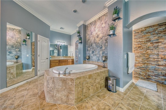 bathroom featuring independent shower and bath, ornamental molding, and vanity