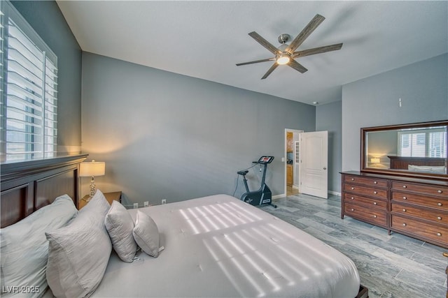 bedroom featuring ceiling fan and wood-type flooring