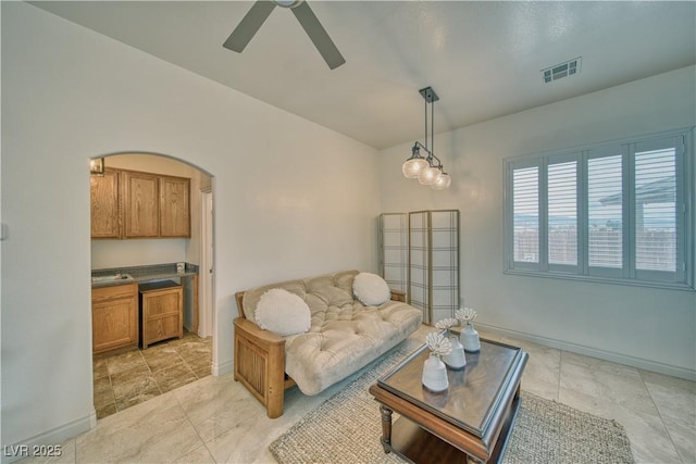 living room featuring ceiling fan