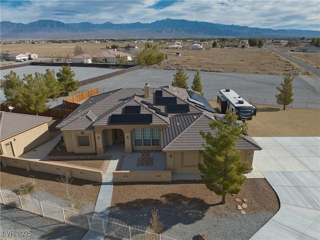 drone / aerial view featuring a mountain view