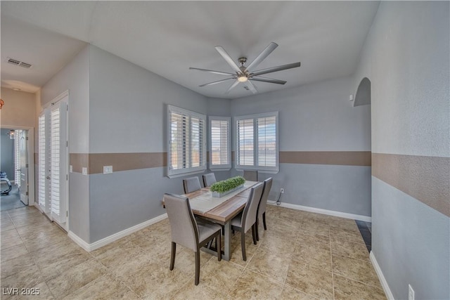 dining room featuring ceiling fan and light tile patterned floors