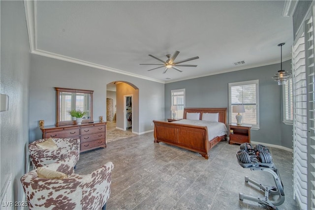 bedroom featuring crown molding, ceiling fan, and light hardwood / wood-style floors