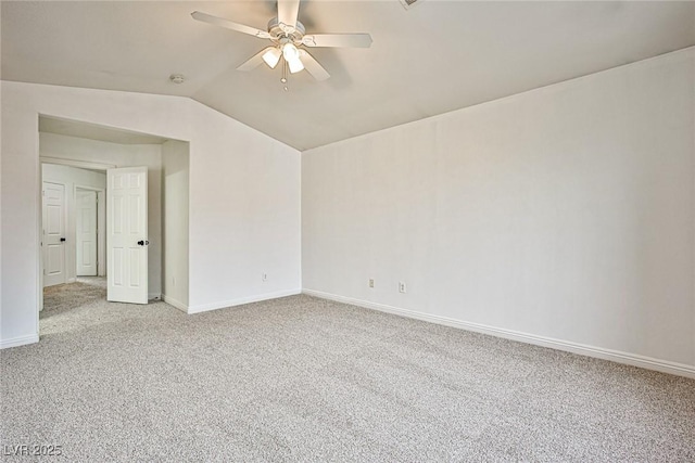 unfurnished room featuring lofted ceiling, ceiling fan, and carpet