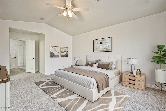 carpeted bedroom featuring ceiling fan and lofted ceiling