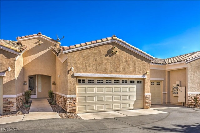 view of front of home with a garage