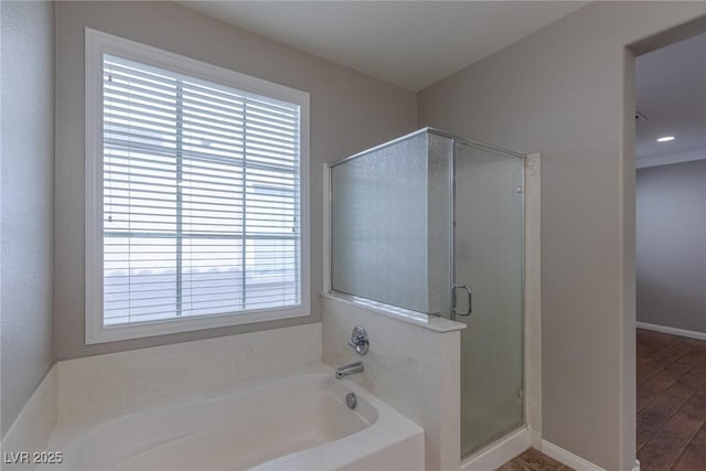 bathroom with independent shower and bath