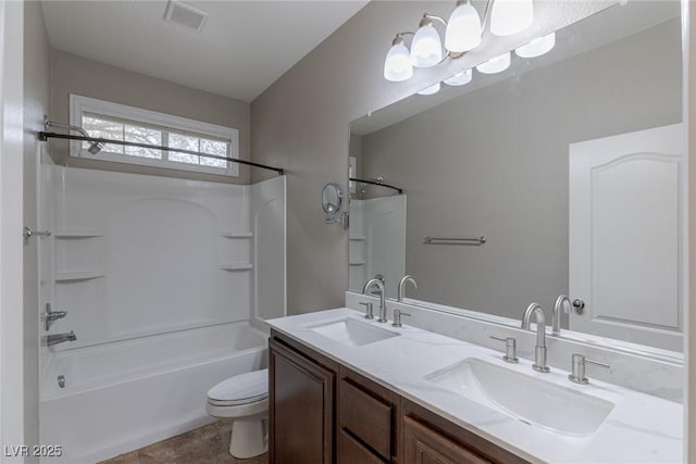 full bathroom with shower / tub combination, vanity, toilet, and tile patterned flooring