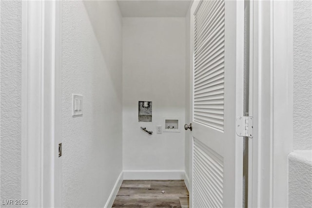 laundry room featuring hookup for a washing machine and hardwood / wood-style floors