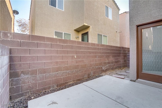 exterior space with a patio area