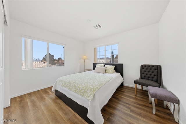 bedroom featuring hardwood / wood-style flooring